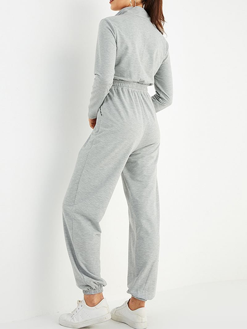 Kvinnor Enfärgad Dragkedja Ficka Långärmad Sport Casual Jumpsuit