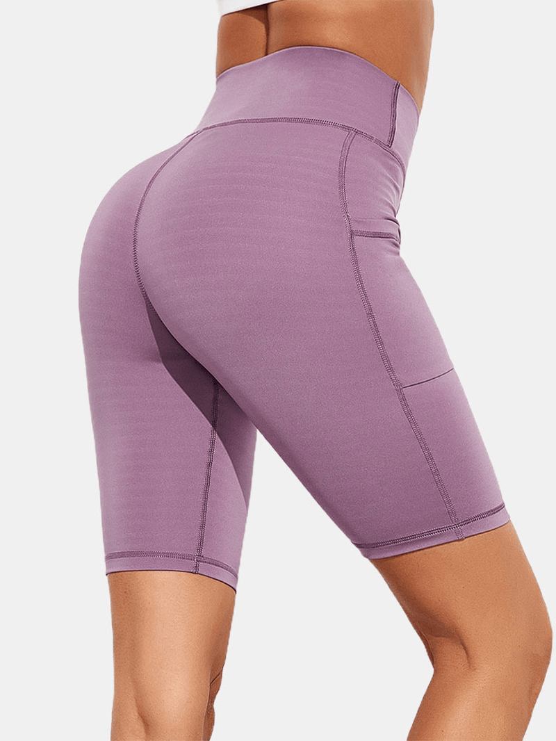 Enfärgad Ficka Slim Hip Lift Yoga Leggings