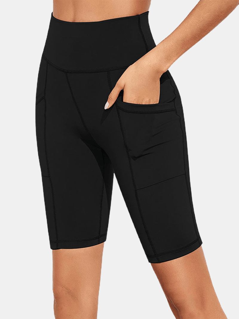 Enfärgad Ficka Slim Hip Lift Yoga Leggings