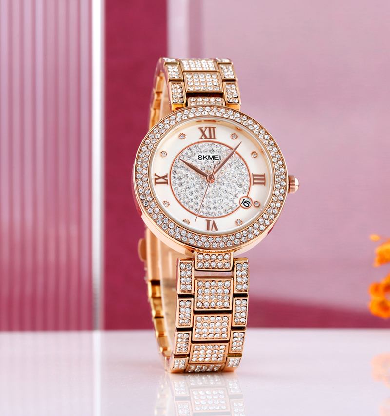 Mode Elegant Klocka Rhinestone Dekoration Zink Watch Armband Datum Display 3atm Vattentät Kvinnlig Kvartsklocka