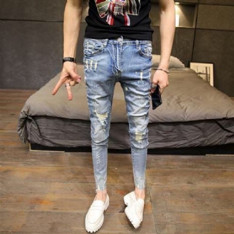 Modetrend För Män Jeans Med Nio Poäng